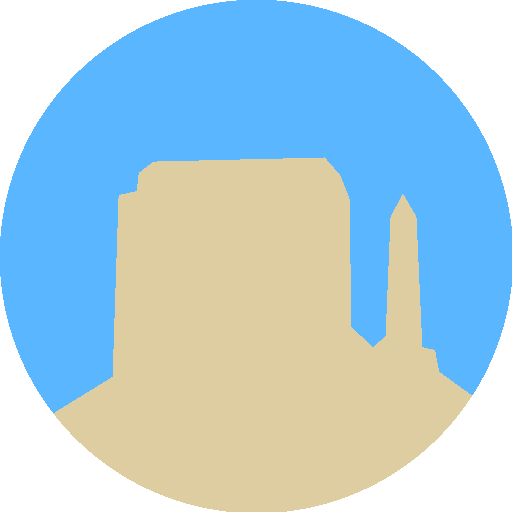 a stylized butte in pale tan on a field of sky blue